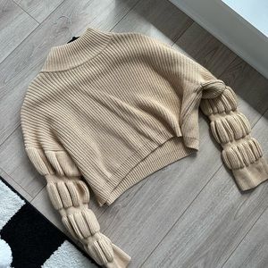 Light brown sweater
